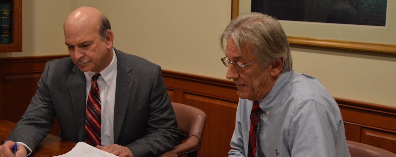 Peter J. Lynch on left; Robert B. Cumler on right